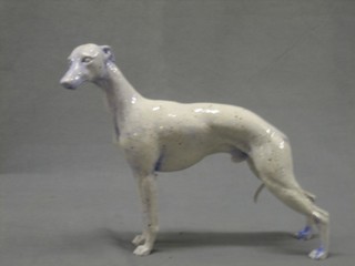 A resin figure of a standing grey hound 8"