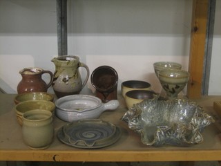 A collection of various Art Pottery