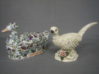An Oriental style trinket box in the form of a seated chicken 12" and 1 other in the form of a pheasant