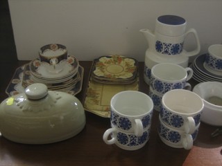 A Derby style tea service, an Irish Alarne blue and white pottery coffee service, a stoneware hotwater bottle and a pair of spurs