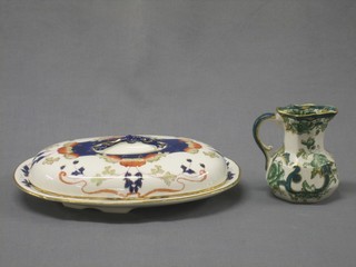 A Masons green patterned jug 4" together with an oval Derby style dish and cover 10"