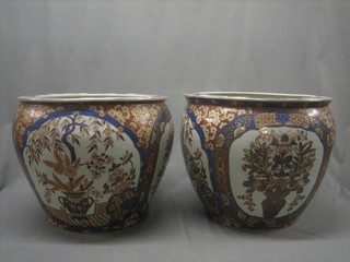 A pair of large and impressive 20th Century Imari style circular fish bowls 19"