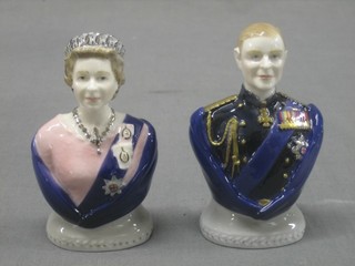 A pair of limited edition Royal Worcester candle snuffers in the form of HM Queen and The Duke of Edinburgh