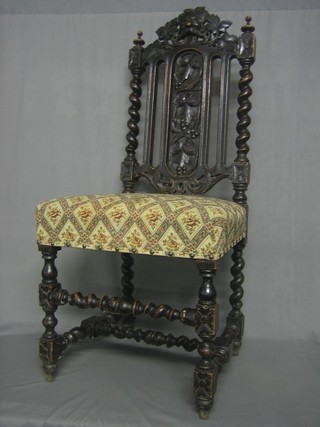 A pair of Victorian carved oak Carolean style high back chairs with pierced slat backs and upholstered seats, raised on turned and block supports (1f)