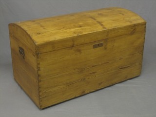 A 19th Century Continental stripped and polished pine domed trunk with iron drop handles 39"