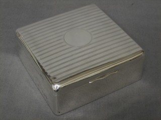 A square silver cigarette box with hinged lid, Birmingham 1924 3"