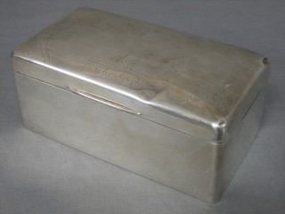 A silver cigarette box with hinged lid Birmingham 1934, 7"