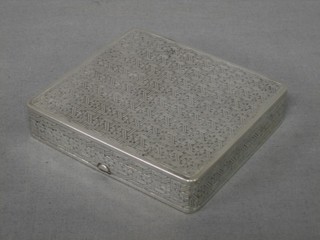 An Eastern engraved silver box with hinged lid, 5 ozs