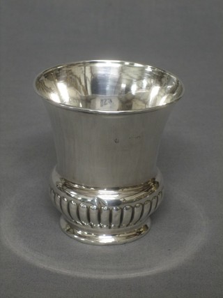 A silver thistle shaped beaker with demi-reeded decoration 2 ozs (marks rubbed)