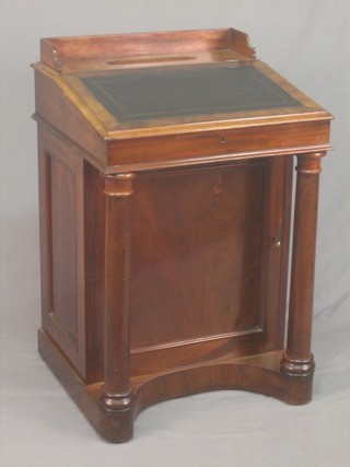 A  William IV rosewood Davenport with three-quarter gallery and pen receptacle, the pedestal raised on turned columns 23"