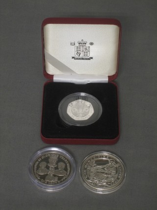 A 2007 silver proof 50 pence piece together with 2 silver proof crowns