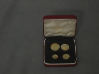 A set of George V 1935 Maundy Money comprising  fourpence, threepence, two pence and a penny, cased