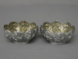 2 Eastern white metal embossed dishes