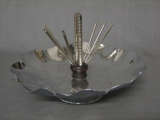 A silver plated nut bowl the centre set a pair of nut crackers and nut picks