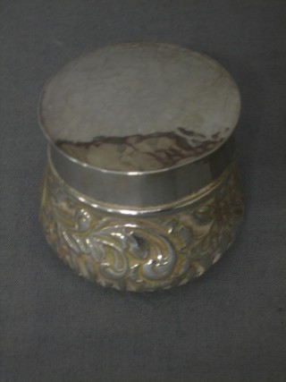 A Victorian circular embossed silver jar, Birmingham 1893, 2"