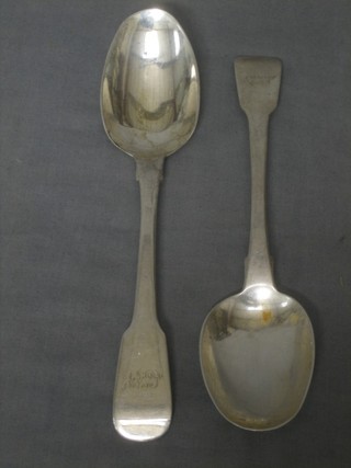 A pair of George III silver fiddle pattern table spoons, London 1814 4 ozs