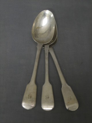 A pair of George III silver fiddle pattern table spoons, London 1821 and 1 other London 1820 (3), 7 ozs
