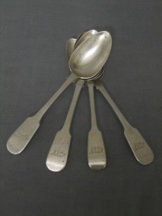 A harlequin set of 4 George III silver fiddle pattern pudding spoons, 3 - London 1786 and 1 - 1824, 6 ozs