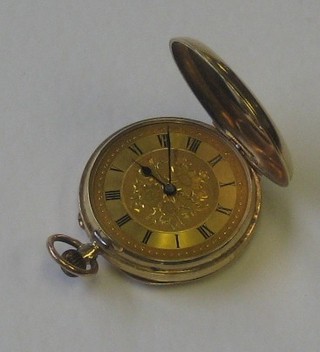 A lady's Continental fob watch contained in a 14ct gold case