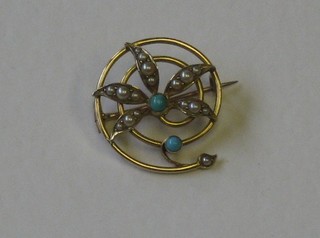 A floral gold brooch set pearls and turquoise