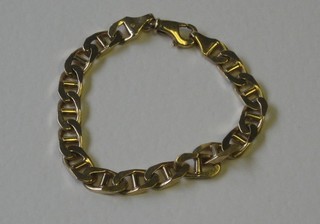 A modern 9ct gold flat link bracelet