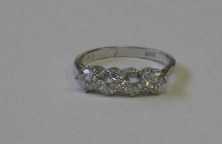 A lady's attractive 18ct white gold dress ring set 4 diamonds approx 1.55ct