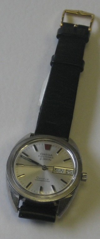 An Omega Electronic wristwatch contained in a stainless steel case