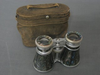 A pair of opera glasses with abalone decoration by L K Leon & Co