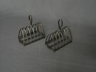 A pair of silver plated 7 bar toast racks by Walker & Hall