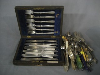 A set of 6 silver plated fish knives and forks contained in an oak canteen box and a small collection of flatware