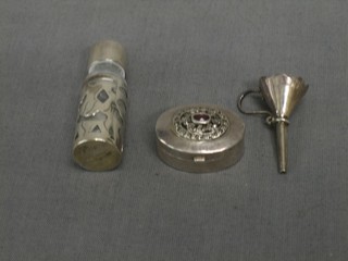 A miniature glass and silver cased perfume bottle with funnel together with a miniature silver pill box 1"