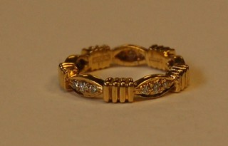 A lady's 18ct yellow gold dress ring set diamonds