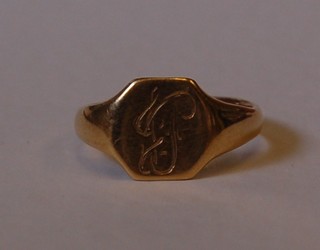 An 18ct gold signet ring cut and joined