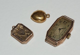 A lady's gold cased wristwatch together with 2 gilt metal lockets