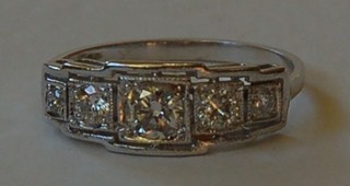 A lady's 18ct white gold dress ring set 5 diamonds approx. 0.55ct