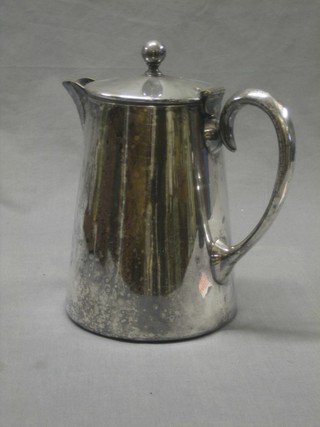 A large silver plated hotwater jug