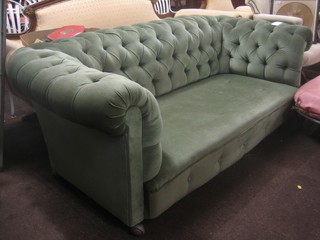 A mahogany framed Chesterfield upholstered in green buttoned Dralon 72"