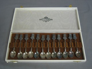 12 various Continental silver coffee spoons with shield decoration 4 ozs, cased