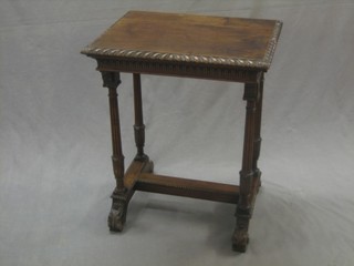 A Victorian rectangular carved mahogany occasional table, raised on 4 turned and reeded columns with H framed stretcher 20"