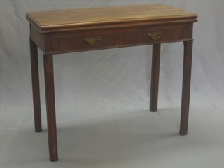 A Georgian mahogany card table, the base fitted a drawer, raised on square supports 34"