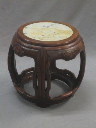 A circular Padouk jardiniere stand with white veined marble top 13"