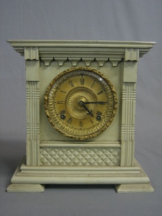A striking American mantel clock with 5" circular gilt dial and Roman numerals contained in a white painted case