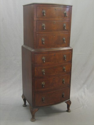 A miniature Georgian style mahogany chest on chest the upper section fitted 3 long drawers, the base fitted 4 long drawers and raised on cabriole supports 16"