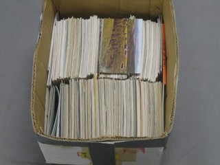 A large collection of various postcards
