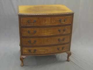 A Chippendale style walnut bow front chest of 4 long drawers with brass swan neck drop handles, raised on cabriole supports 29"