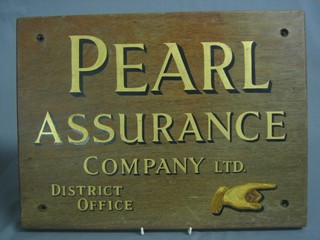 A painted wooden sign - Pearl Assurance Company District Office