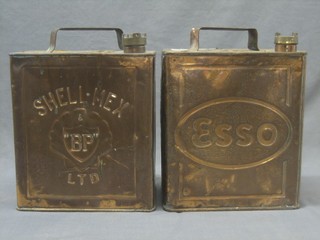 A copper Shell Max and BP Ltd petrol can, the base marked 5-38 together with an Esso petrol can (2)