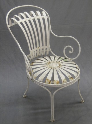 A  set of 8 white painted wrought iron garden armchairs