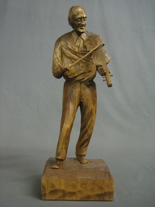 Caron, a carved wooden model of a Fiddler 17"