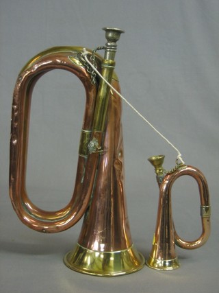 A copper and brass bugle by Boosey & Hawke together with a miniature copper and brass bulge